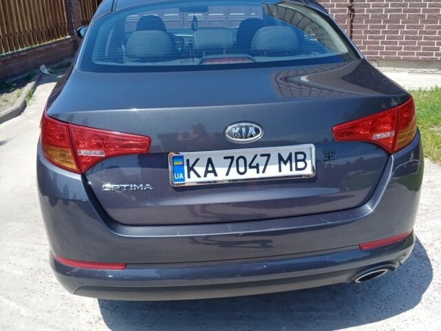 Серый Киа Оптима, объемом двигателя 2 л и пробегом 150 тыс. км за 10000 $, фото 7 на Automoto.ua