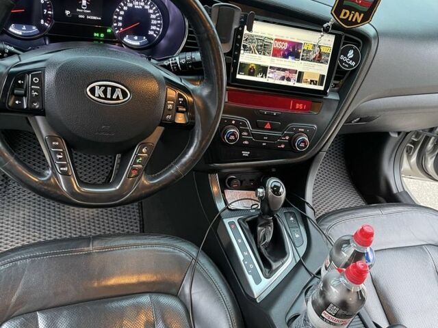 Серый Киа Оптима, объемом двигателя 2 л и пробегом 243 тыс. км за 10500 $, фото 19 на Automoto.ua