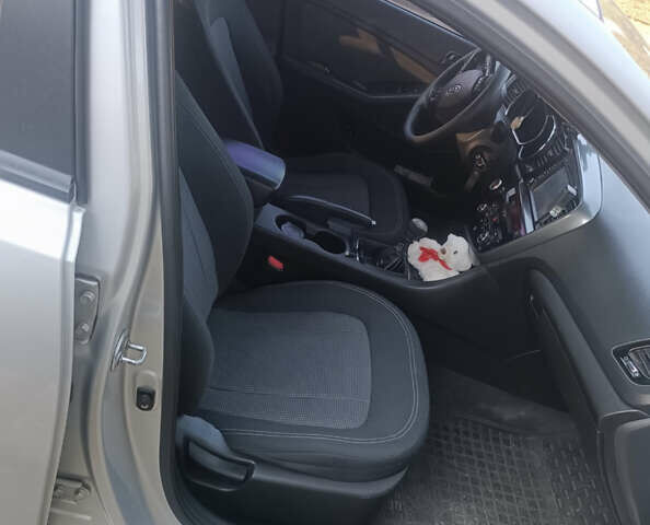 Серый Киа Оптима, объемом двигателя 2 л и пробегом 195 тыс. км за 10700 $, фото 5 на Automoto.ua