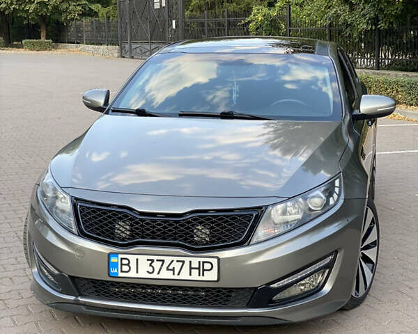 Серый Киа Оптима, объемом двигателя 2 л и пробегом 265 тыс. км за 10400 $, фото 2 на Automoto.ua