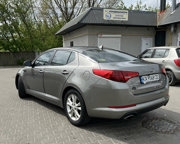 Серый Киа Оптима, объемом двигателя 2.36 л и пробегом 225 тыс. км за 7300 $, фото 2 на Automoto.ua