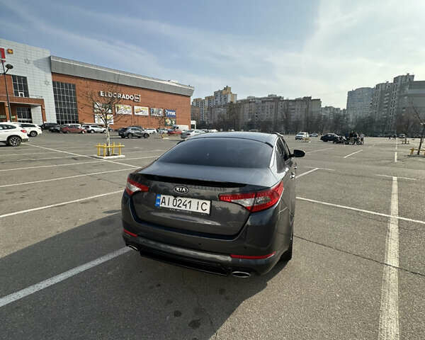 Серый Киа Оптима, объемом двигателя 2 л и пробегом 187 тыс. км за 10100 $, фото 1 на Automoto.ua