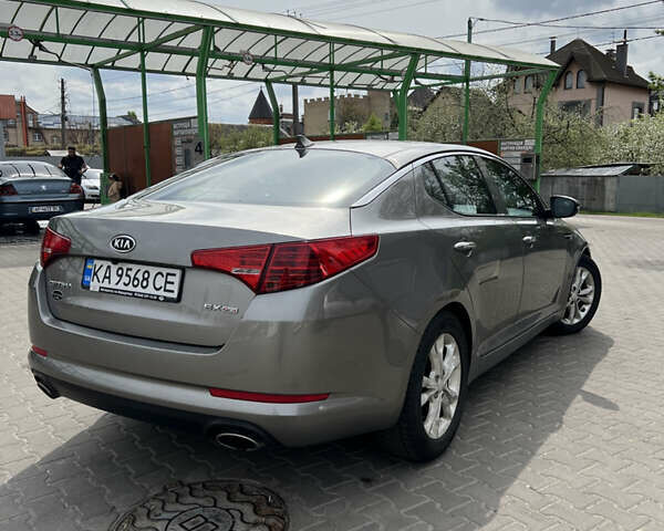Серый Киа Оптима, объемом двигателя 2.36 л и пробегом 225 тыс. км за 7300 $, фото 4 на Automoto.ua
