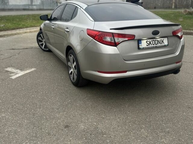 Серый Киа Оптима, объемом двигателя 2 л и пробегом 243 тыс. км за 10500 $, фото 2 на Automoto.ua