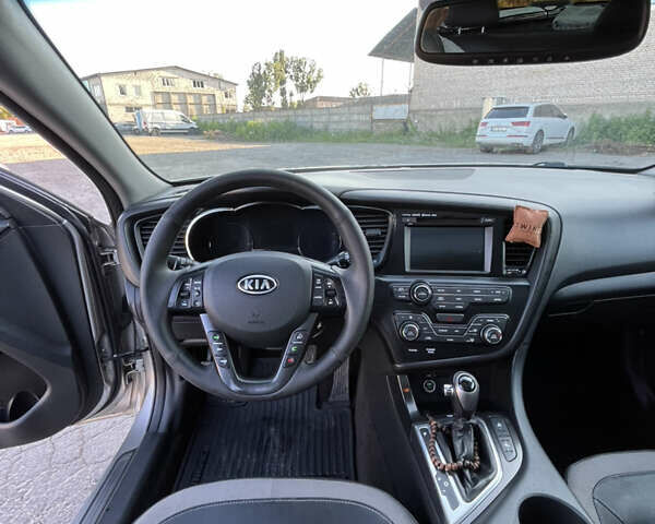 Серый Киа Оптима, объемом двигателя 2.36 л и пробегом 154 тыс. км за 10000 $, фото 7 на Automoto.ua