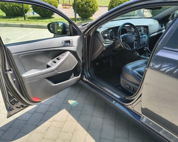 Сірий Кіа Оптіма, об'ємом двигуна 2 л та пробігом 175 тис. км за 9999 $, фото 37 на Automoto.ua