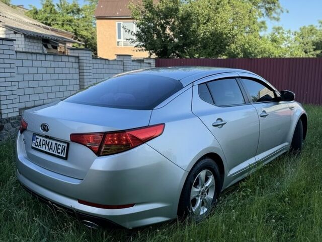 Серый Киа Оптима, объемом двигателя 2 л и пробегом 230 тыс. км за 7800 $, фото 4 на Automoto.ua