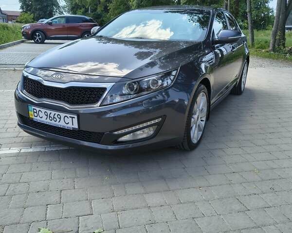 Сірий Кіа Оптіма, об'ємом двигуна 2 л та пробігом 175 тис. км за 9999 $, фото 11 на Automoto.ua
