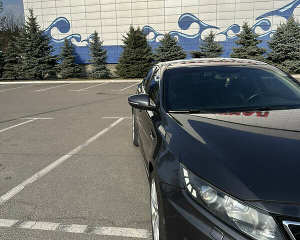Серый Киа Оптима, объемом двигателя 2 л и пробегом 187 тыс. км за 10100 $, фото 2 на Automoto.ua