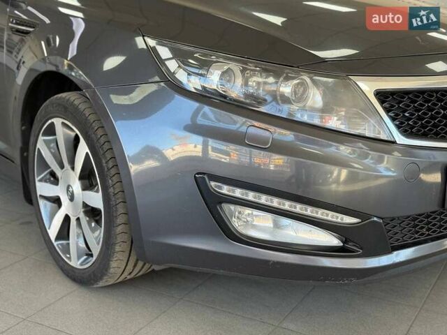 Серый Киа Оптима, объемом двигателя 2 л и пробегом 145 тыс. км за 10490 $, фото 2 на Automoto.ua