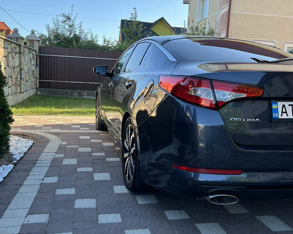 Серый Киа Оптима, объемом двигателя 2 л и пробегом 260 тыс. км за 8950 $, фото 15 на Automoto.ua