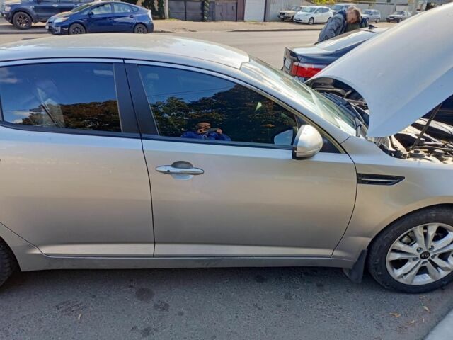 Серый Киа Оптима, объемом двигателя 2 л и пробегом 220 тыс. км за 8599 $, фото 4 на Automoto.ua