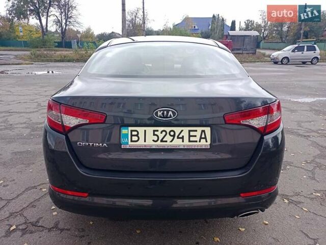 Серый Киа Оптима, объемом двигателя 2 л и пробегом 102 тыс. км за 9999 $, фото 3 на Automoto.ua