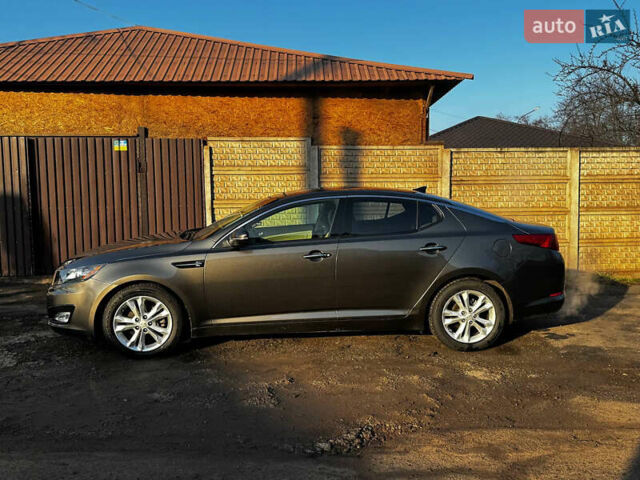Сірий Кіа Оптіма, об'ємом двигуна 2.36 л та пробігом 218 тис. км за 9200 $, фото 6 на Automoto.ua