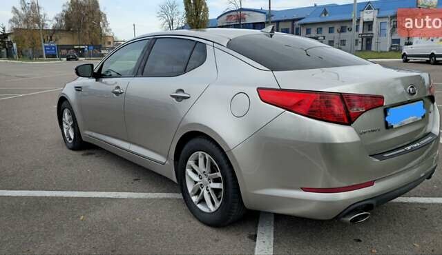 Сірий Кіа Оптіма, об'ємом двигуна 2.36 л та пробігом 112 тис. км за 9500 $, фото 4 на Automoto.ua