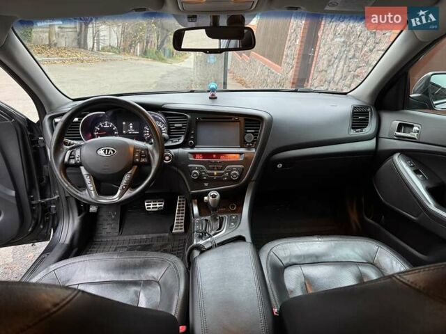Серый Киа Оптима, объемом двигателя 2 л и пробегом 211 тыс. км за 10200 $, фото 8 на Automoto.ua