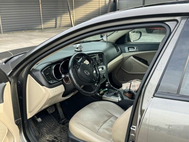 Серый Киа Оптима, объемом двигателя 2.4 л и пробегом 200 тыс. км за 8999 $, фото 3 на Automoto.ua