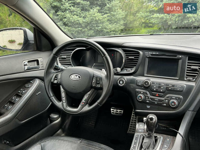 Серый Киа Оптима, объемом двигателя 1.69 л и пробегом 168 тыс. км за 11500 $, фото 28 на Automoto.ua