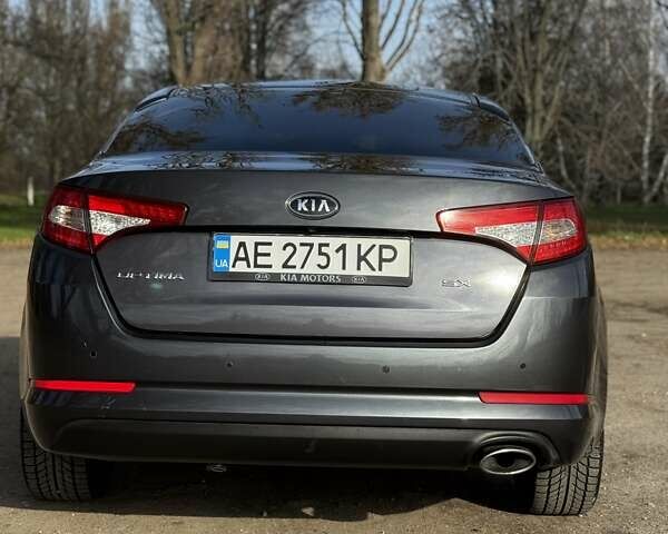 Сірий Кіа Оптіма, об'ємом двигуна 2 л та пробігом 277 тис. км за 9948 $, фото 1 на Automoto.ua