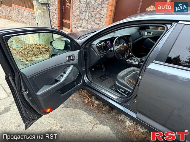 Сірий Кіа Оптіма, об'ємом двигуна 2 л та пробігом 211 тис. км за 10000 $, фото 5 на Automoto.ua