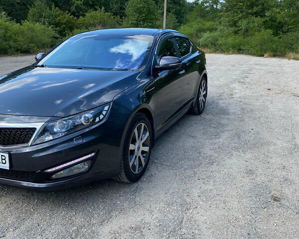 Серый Киа Оптима, объемом двигателя 2 л и пробегом 158 тыс. км за 10800 $, фото 2 на Automoto.ua