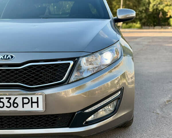 Серый Киа Оптима, объемом двигателя 2 л и пробегом 168 тыс. км за 10450 $, фото 6 на Automoto.ua