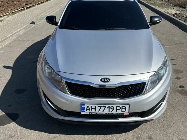 Сірий Кіа Оптіма, об'ємом двигуна 2 л та пробігом 248 тис. км за 9500 $, фото 1 на Automoto.ua