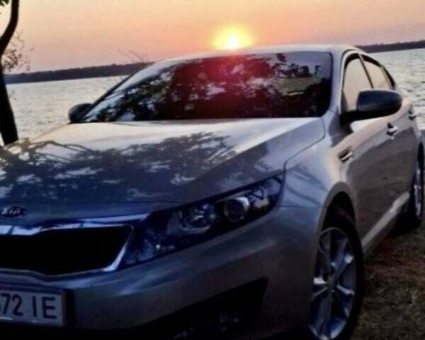 Сірий Кіа Оптіма, об'ємом двигуна 2.4 л та пробігом 210 тис. км за 10500 $, фото 9 на Automoto.ua