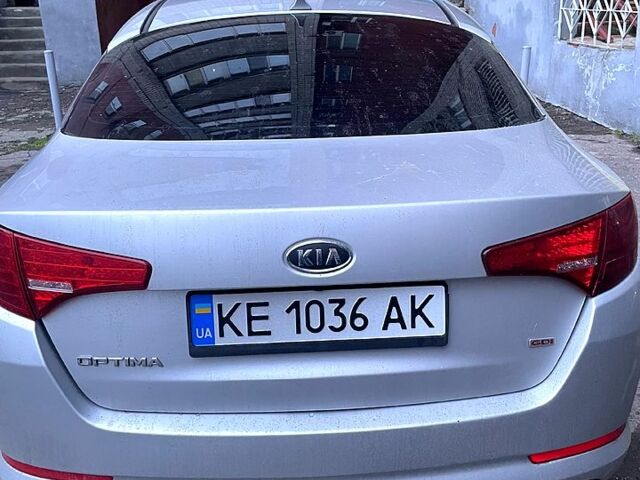 Серый Киа Оптима, объемом двигателя 2.4 л и пробегом 250 тыс. км за 9500 $, фото 6 на Automoto.ua