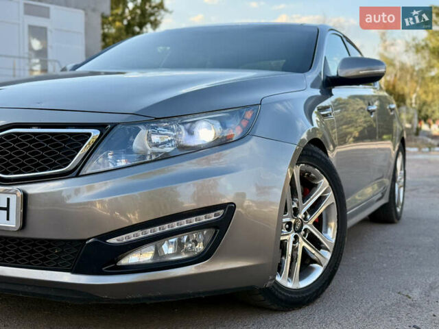 Серый Киа Оптима, объемом двигателя 2 л и пробегом 168 тыс. км за 10450 $, фото 3 на Automoto.ua