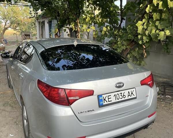 Серый Киа Оптима, объемом двигателя 2.4 л и пробегом 250 тыс. км за 9500 $, фото 3 на Automoto.ua