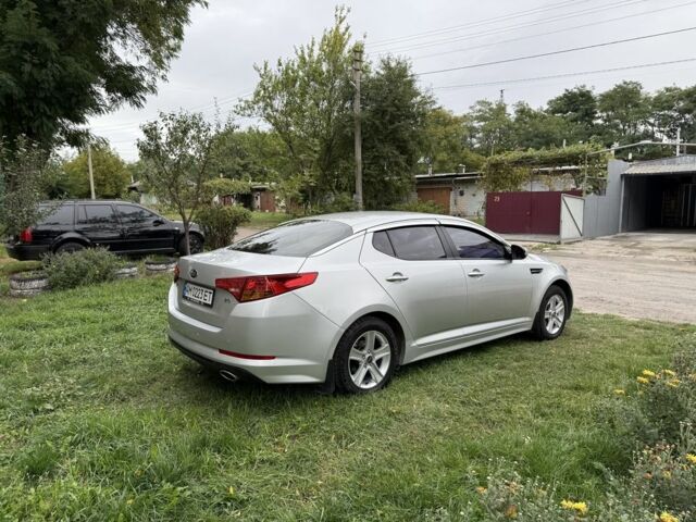 Серый Киа Оптима, объемом двигателя 2 л и пробегом 280 тыс. км за 7500 $, фото 2 на Automoto.ua