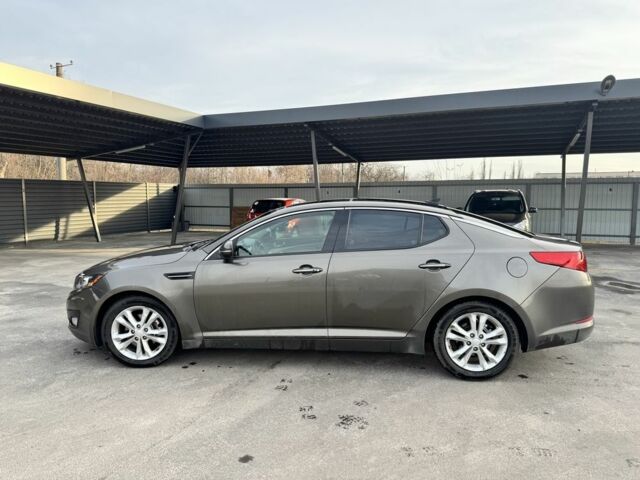 Серый Киа Оптима, объемом двигателя 2.4 л и пробегом 200 тыс. км за 8999 $, фото 2 на Automoto.ua