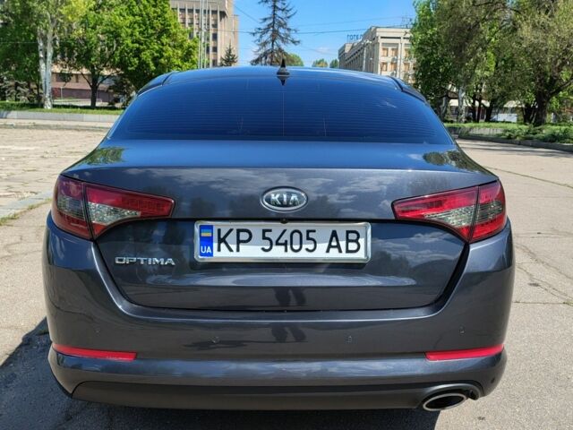 Сірий Кіа Оптіма, об'ємом двигуна 2 л та пробігом 200 тис. км за 10999 $, фото 4 на Automoto.ua