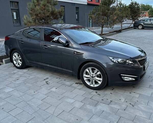 Серый Киа Оптима, объемом двигателя 2 л и пробегом 83 тыс. км за 10800 $, фото 2 на Automoto.ua