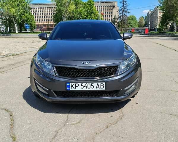 Сірий Кіа Оптіма, об'ємом двигуна 2 л та пробігом 200 тис. км за 10999 $, фото 5 на Automoto.ua
