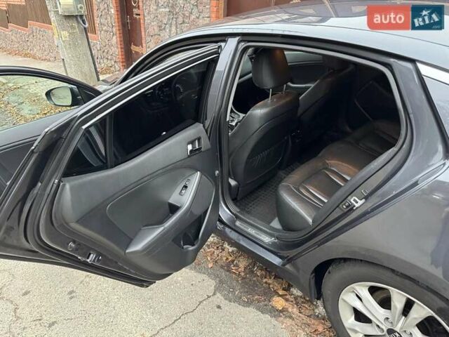 Сірий Кіа Оптіма, об'ємом двигуна 2 л та пробігом 211 тис. км за 10000 $, фото 6 на Automoto.ua