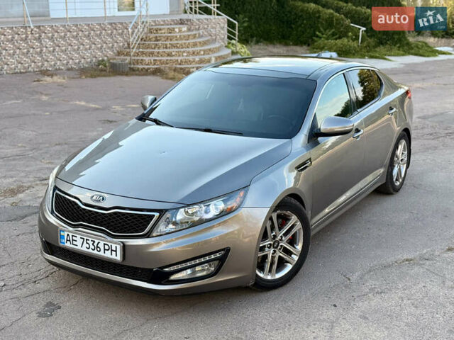 Серый Киа Оптима, объемом двигателя 2 л и пробегом 168 тыс. км за 10450 $, фото 1 на Automoto.ua