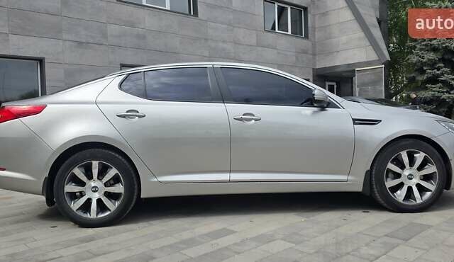 Серый Киа Оптима, объемом двигателя 2 л и пробегом 308 тыс. км за 11300 $, фото 2 на Automoto.ua