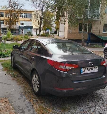 Серый Киа Оптима, объемом двигателя 2 л и пробегом 101 тыс. км за 9000 $, фото 4 на Automoto.ua