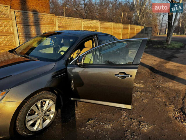 Сірий Кіа Оптіма, об'ємом двигуна 2.36 л та пробігом 218 тис. км за 9200 $, фото 43 на Automoto.ua