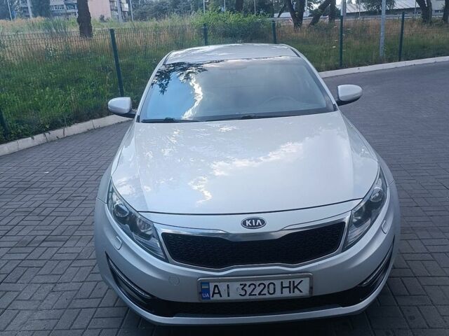 Серый Киа Оптима, объемом двигателя 2 л и пробегом 174 тыс. км за 10250 $, фото 2 на Automoto.ua