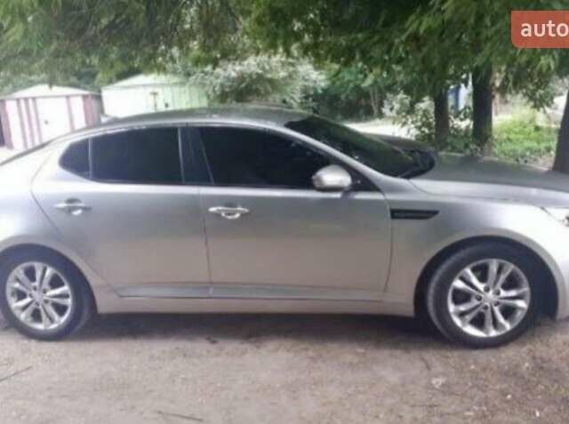 Сірий Кіа Оптіма, об'ємом двигуна 2.4 л та пробігом 210 тис. км за 10500 $, фото 6 на Automoto.ua