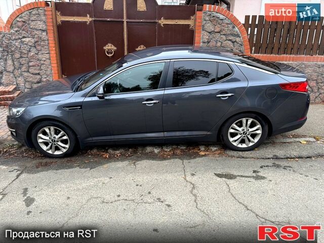 Серый Киа Оптима, объемом двигателя 2 л и пробегом 211 тыс. км за 10000 $, фото 4 на Automoto.ua