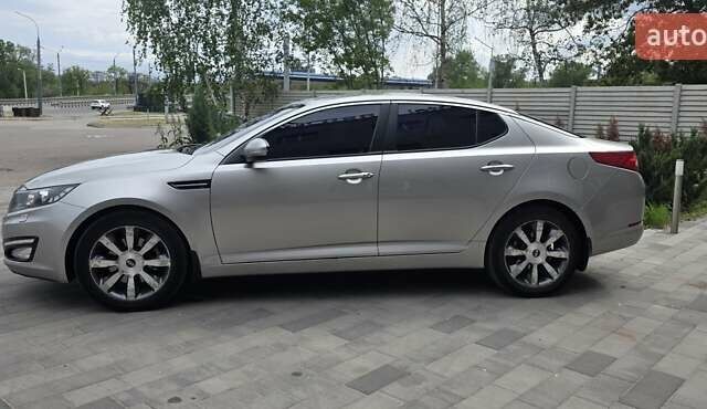 Серый Киа Оптима, объемом двигателя 2 л и пробегом 308 тыс. км за 11300 $, фото 5 на Automoto.ua