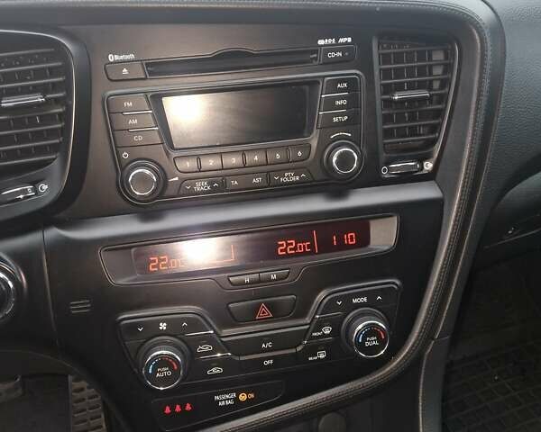 Серый Киа Оптима, объемом двигателя 2 л и пробегом 323 тыс. км за 9300 $, фото 10 на Automoto.ua