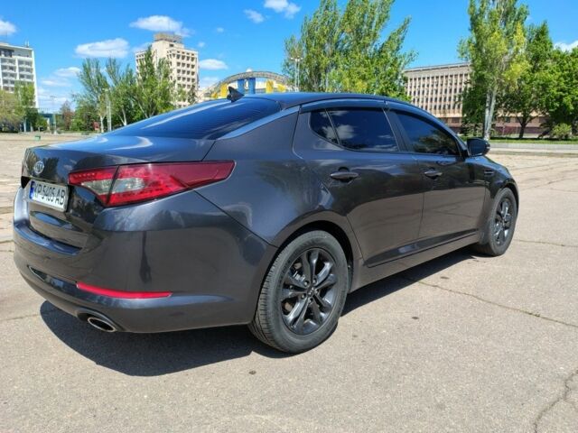 Сірий Кіа Оптіма, об'ємом двигуна 2 л та пробігом 200 тис. км за 10999 $, фото 6 на Automoto.ua