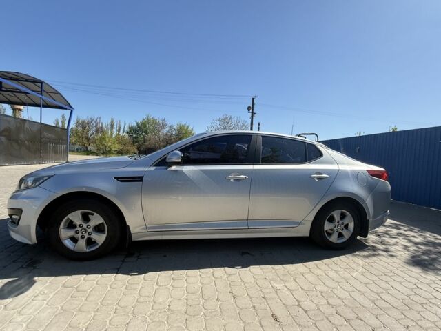 Серый Киа Оптима, объемом двигателя 2 л и пробегом 300 тыс. км за 6900 $, фото 2 на Automoto.ua