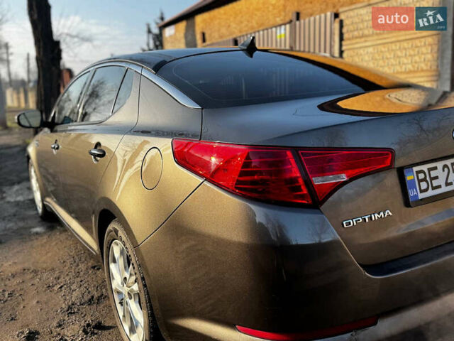 Сірий Кіа Оптіма, об'ємом двигуна 2.36 л та пробігом 218 тис. км за 9200 $, фото 8 на Automoto.ua