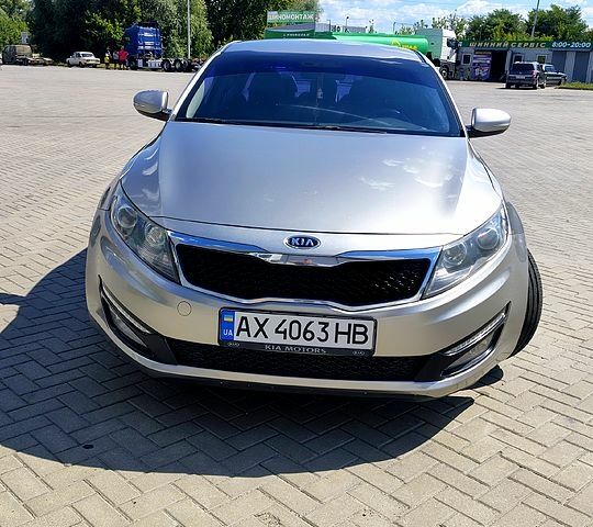 Серый Киа Оптима, объемом двигателя 2 л и пробегом 249 тыс. км за 9800 $, фото 1 на Automoto.ua